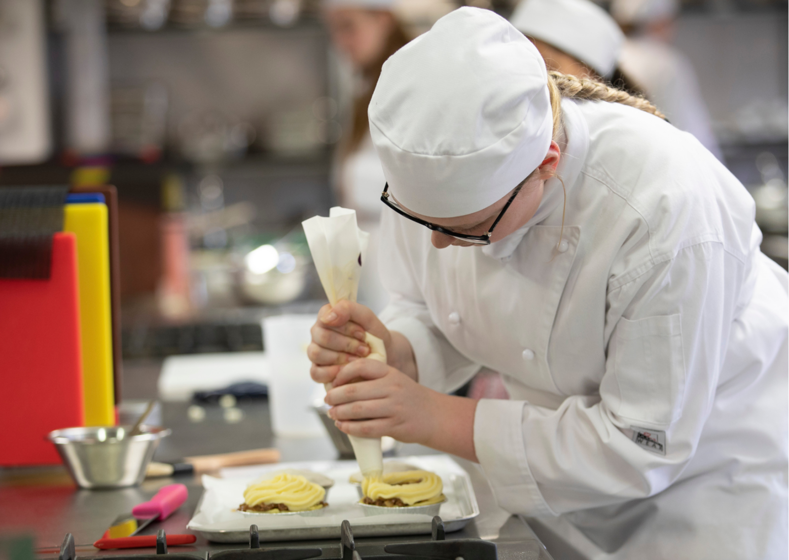 Student working in hospitality kitchen at St Benedict's Catholic College